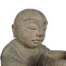 Cement-Monk-With-Bowl-Statue-Close-Up.jpg