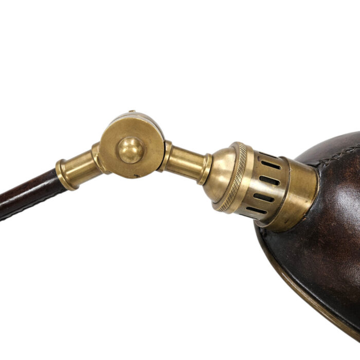 Floor-standing-leather-and-brass-lamp-close-up.jpg Floor-standing-leather-and-brass-lamp-close-up.jpg