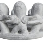 Grey-Circle-Of-Men-Candle-Holder-Close-Up.jpg