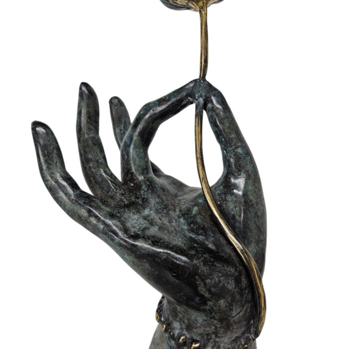 Metal-Decorative-Hand-Holding-Rose-Close-Up.jpg Metal-Decorative-Hand-Holding-Rose-Close-Up.jpg